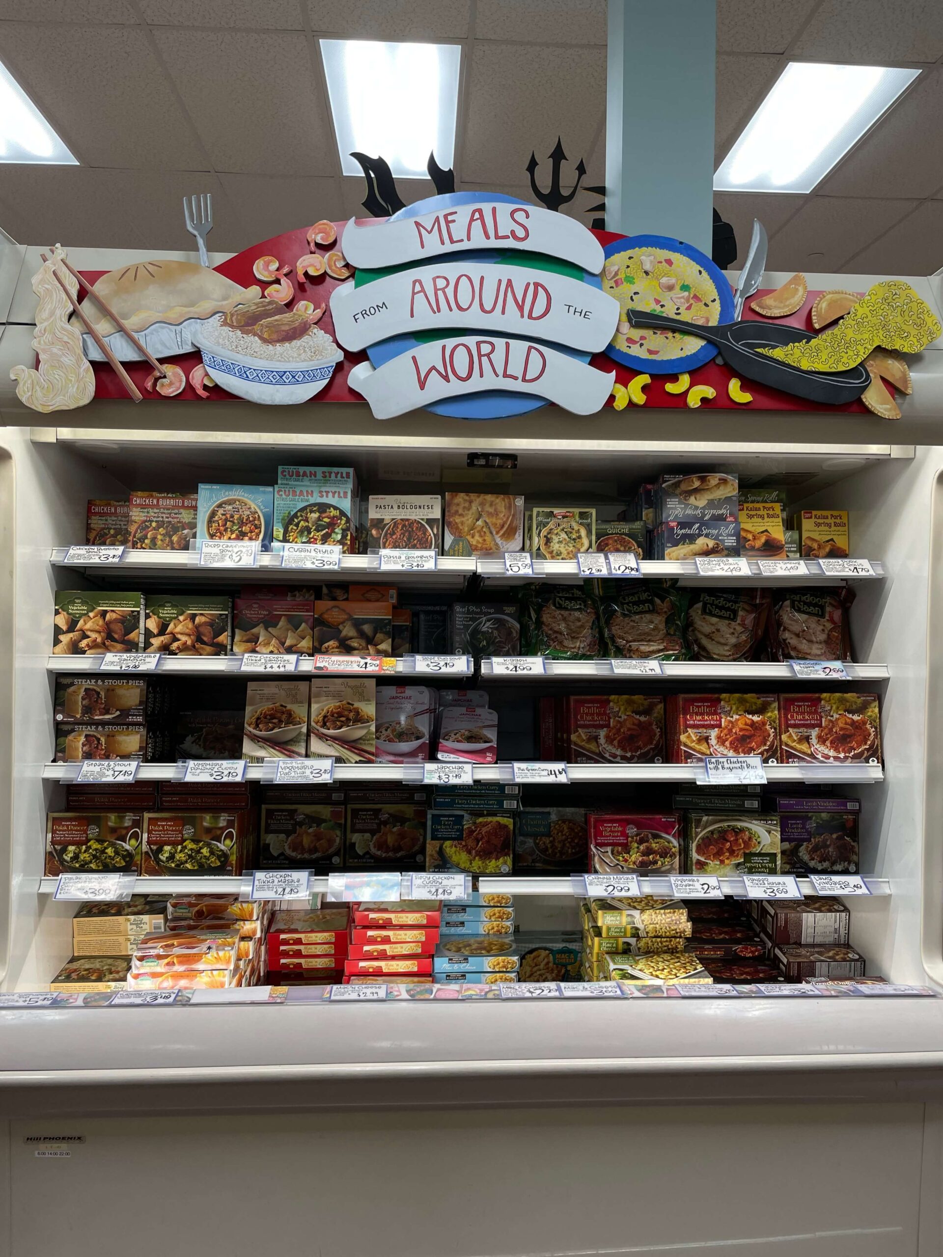 frozen pizzas and macaroni at Trader Joe's in the freezer section. 