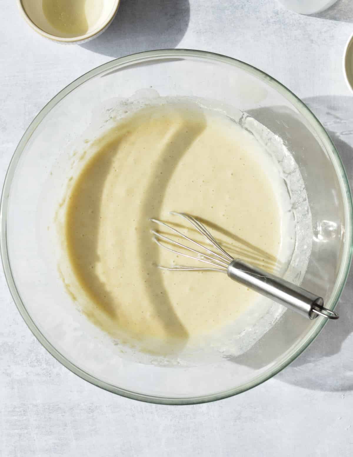 a bowl of thin pancake batter