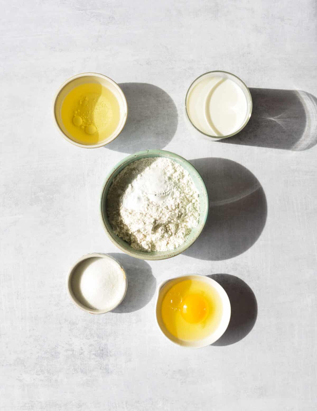 oil, milk, flour, egg, and sugar. 